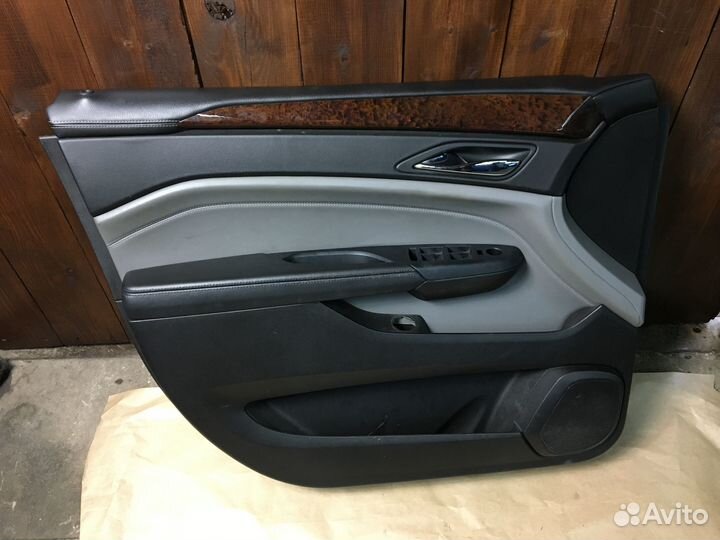 Обшивка двери передняя левая Cadillac SRX II 09-16