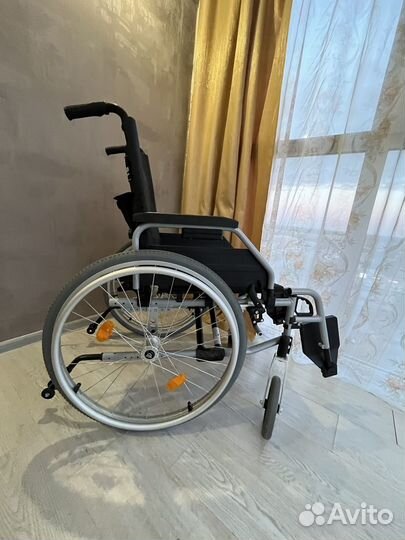 Инвалидная коляска