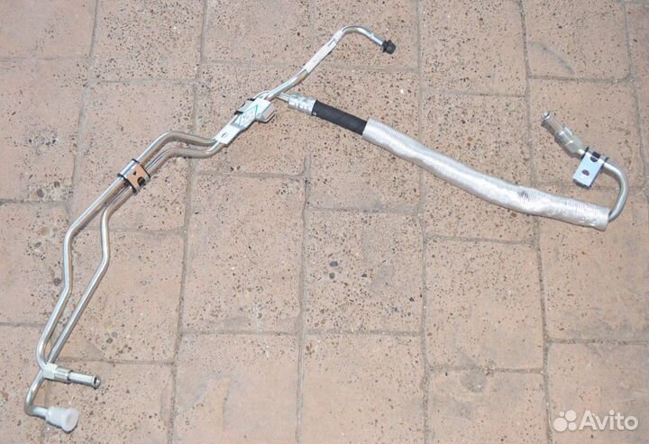 Трубка гур Geely Emgrand EC7