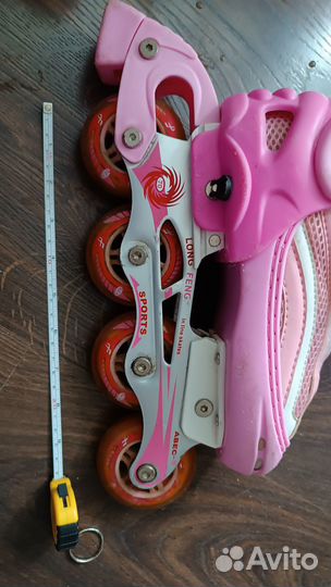 Роликовые коньки