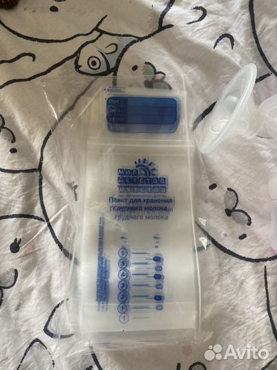 Молокоотсос и пакеты для грудного молока