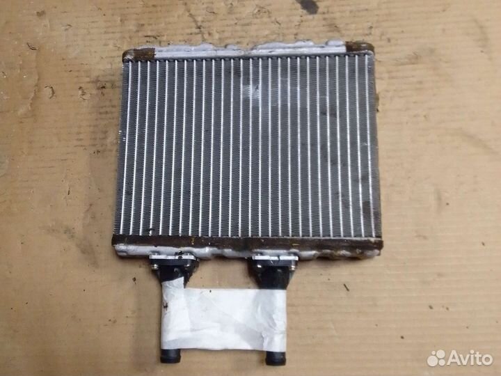 Радиатор печки Nissan almera n16