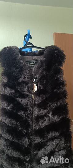 Жилетка меховая женская