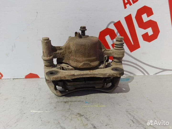 Суппорт тормозной передний левый Hyundai Accent