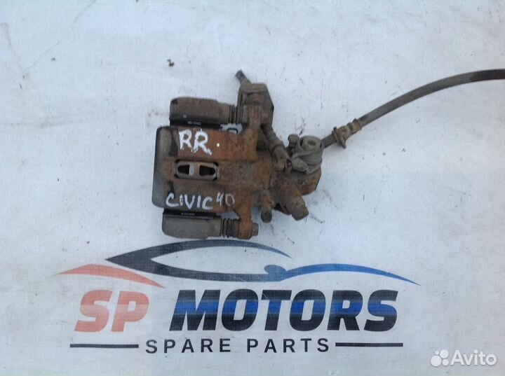 Суппорт задний правый (в сборе со скобой) Honda Ci