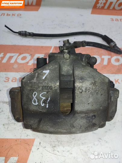 Суппорт тормозной передний левый Volkswagen Golf 5