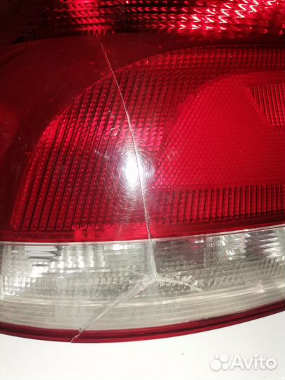 Фонарь задний левый б/у на Поло седан. Оригинал