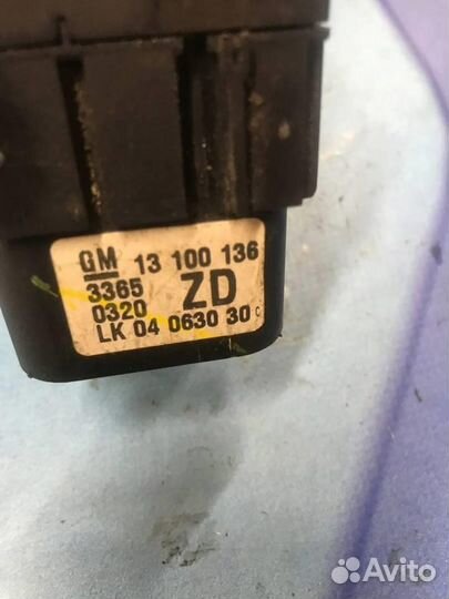 Блок управления фарами 13100136