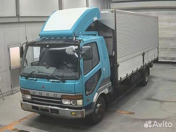 Реснички под фару Mitsubishi Fuso Fighter пара