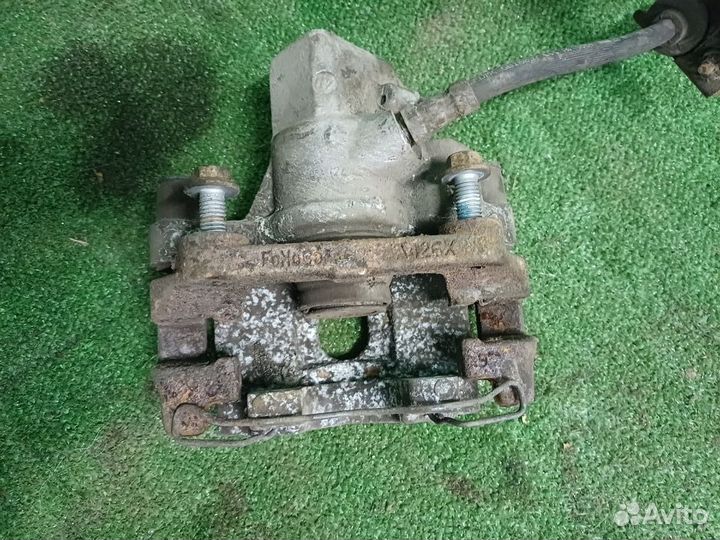 Суппорт задний левый Ford Focus 3