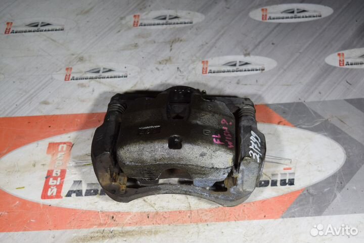 Суппорт перед лево c Toyota Estima ACR50W 2AZ-FE