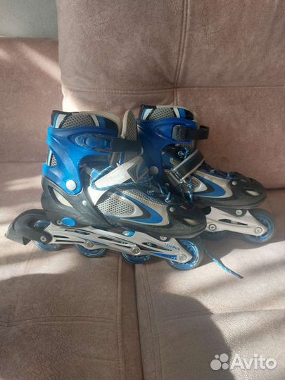 Роликовые коньки