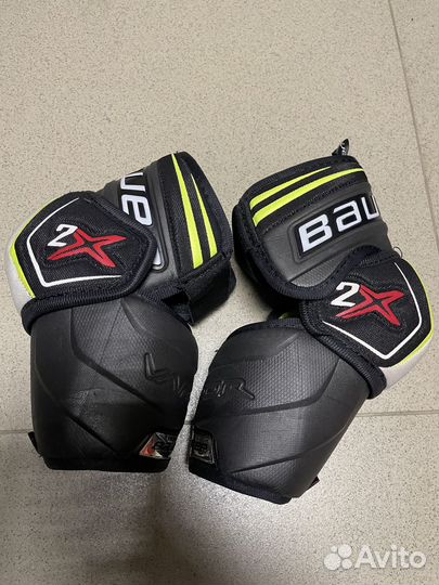 Налокотники хоккейные разные