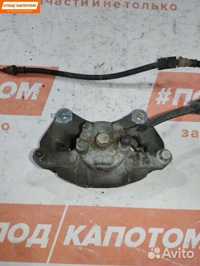 Суппорт тормозной передний левый Mitsubishi 2