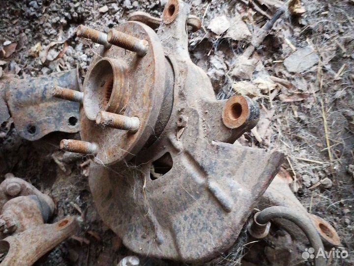 Кулак поворотный передний Geely emgrand x7