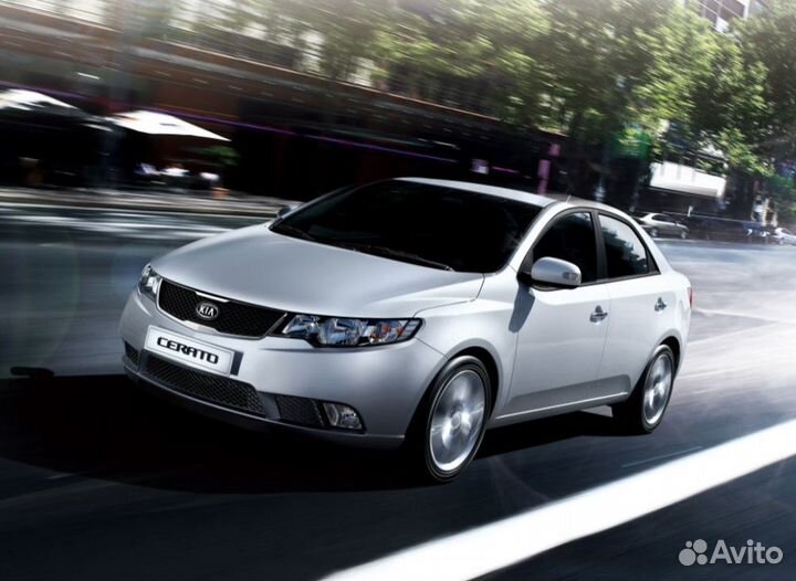 Стекло фары Kia Cerato TD