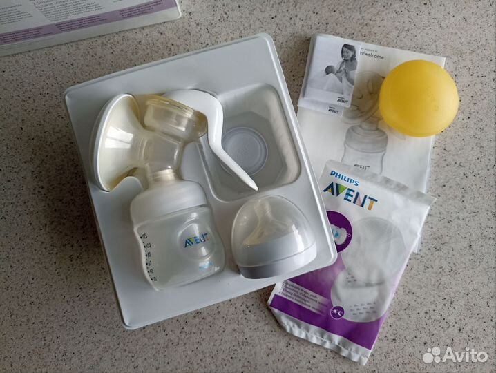 Молокоотсос avent ручной, накладки medela M