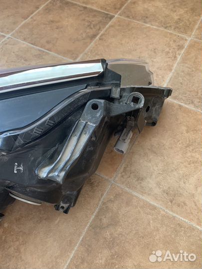 Фара левая Toyota Camry 55 AFS