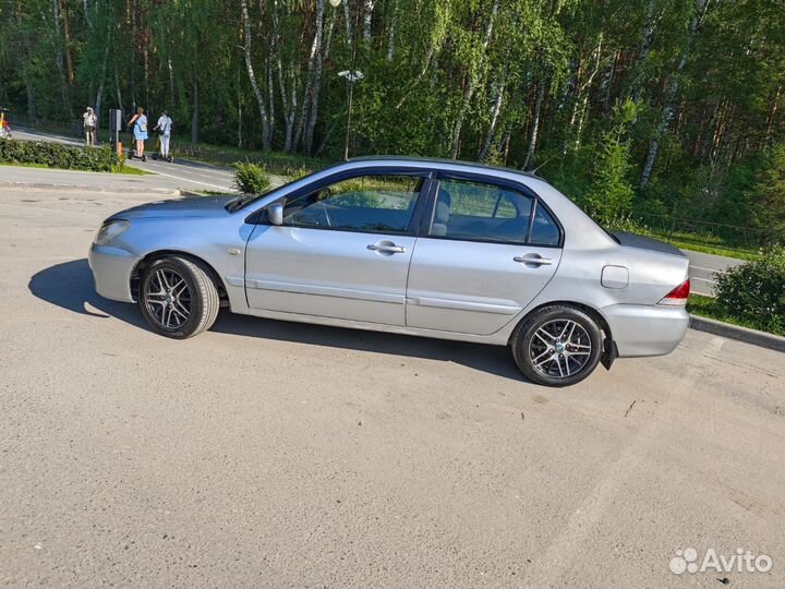 Mitsubishi Lancer 1.6 МТ, 2005, 200 000 км