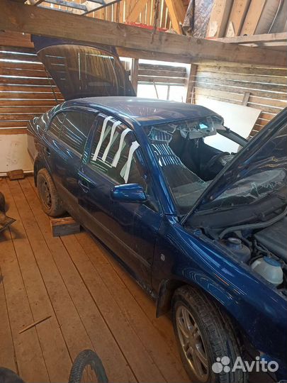 Зеркало Skoda Octavia tour