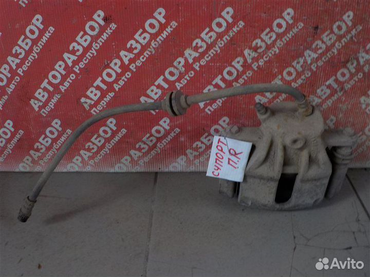 Суппорт тормозной передний правый Renault Duster