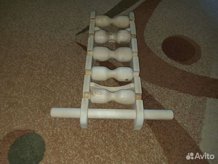Массажер для спины из пяти роликов
