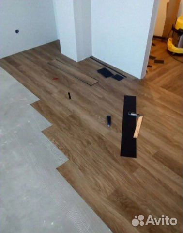 Укладка ламината, поклейка обоев