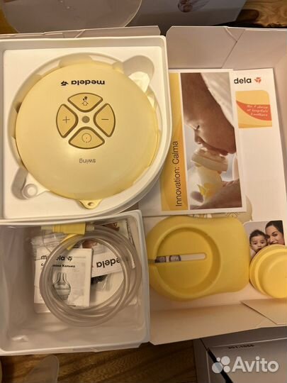 Электрический молокоотсос Midela