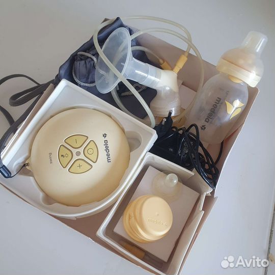 Молокоотсос medela swing электрический