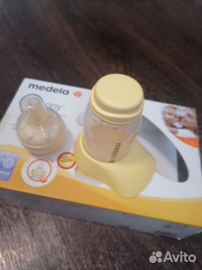 Молокоотсос medela ручной