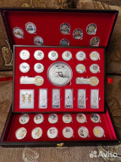 Монеты Китая 65 шт посеребренные