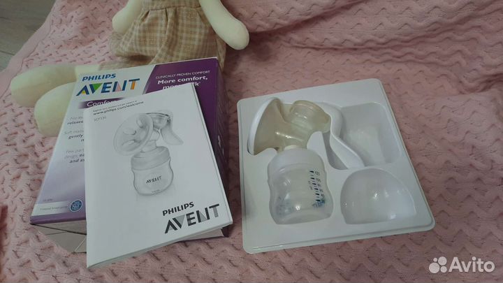 Молокоотсос и прокладки на грудь