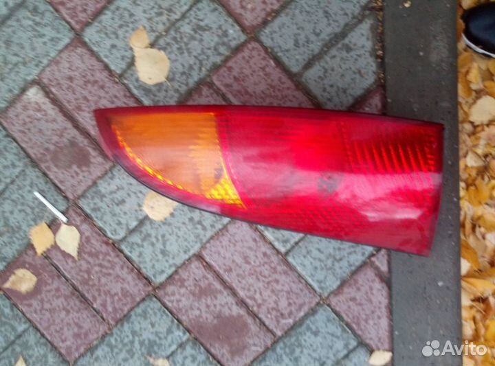 Фонарь левый хечбэк Фокус 1 1998-2004