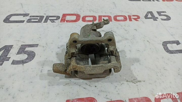 Суппорт задний правый б/у для Audi A3 (1K0615424M)