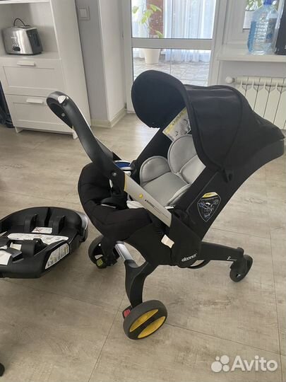 Коляска автокресло doona с базой isofix