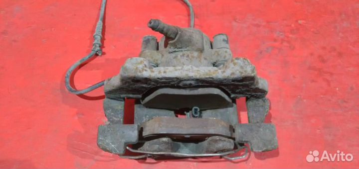 Мерседес Е-класс суппорт передний левый W 210