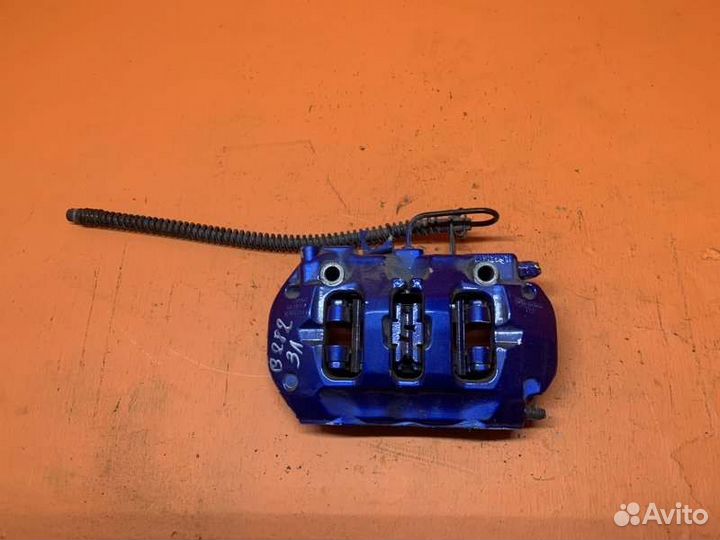 Суппорт тормозной задний левый Porsche Cayenne 958