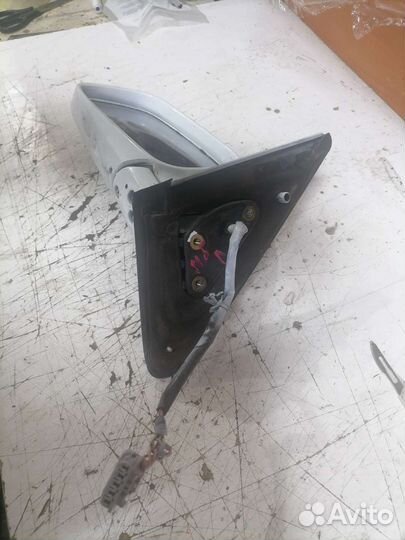 Левое зеркало Nissan Bluebird