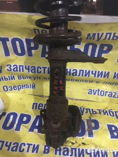 Стойка амортизатора переднего правого Chevrolet La