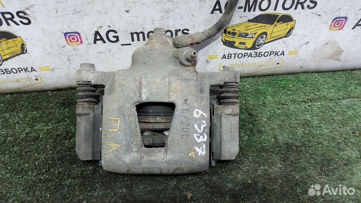 Супорт тормозной передний левый Шевроле Ланос