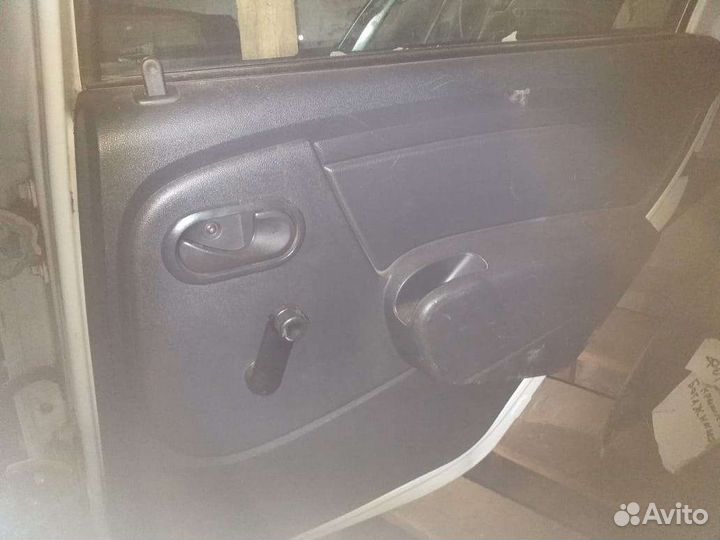 Дверные карты Рено Логан 2014г