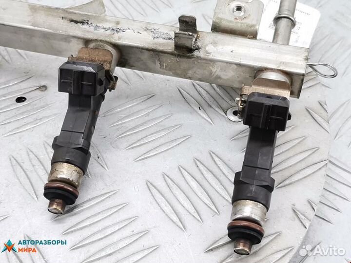 Форсунка Opel Corsa D 2007 55562250