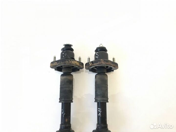 Стойка амортизатора Outlander 3,2012, GF3W