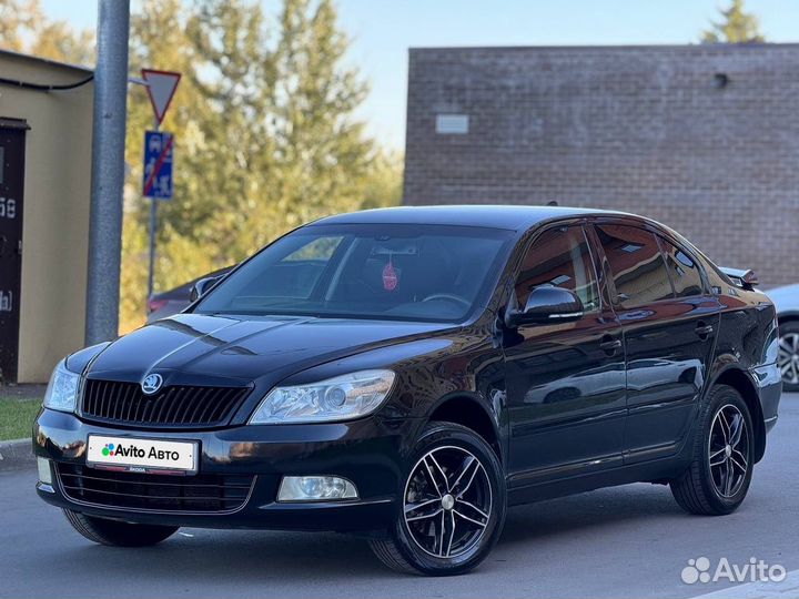 Skoda Octavia 1.8 МТ, 2012, 233 000 км