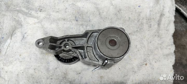 Натяжной ролик