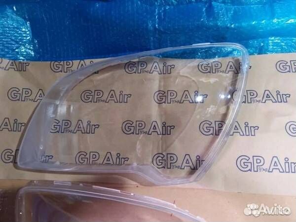 Стекло фары Kia Sportage II Рестайлинг