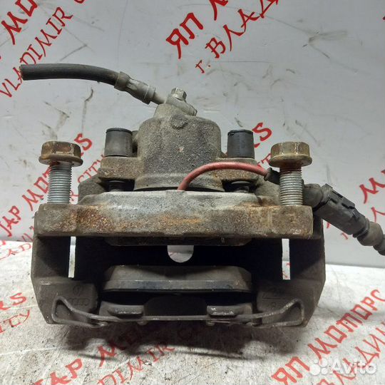 Суппорт тормозной передний левый Volkswagen Touran