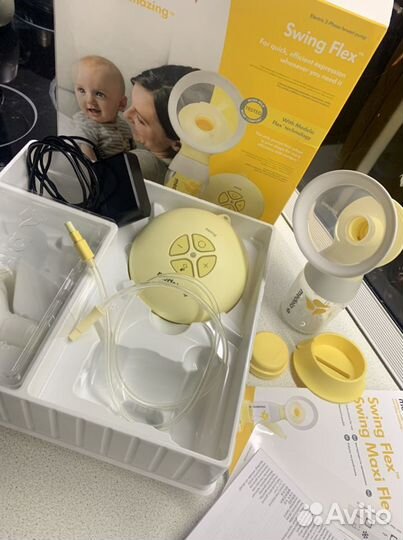 Молокоотсос medela swing flex электрический