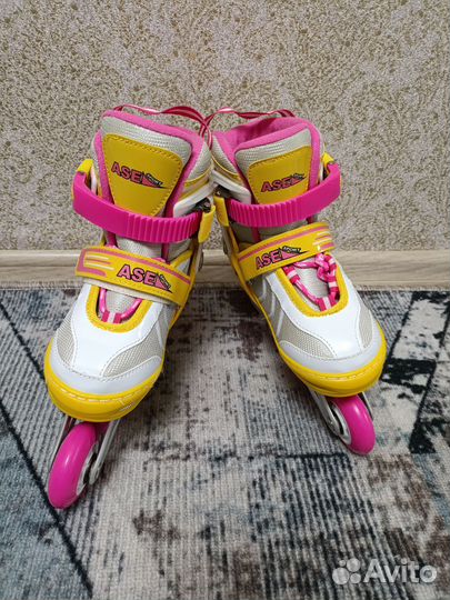 Роликовые коньки