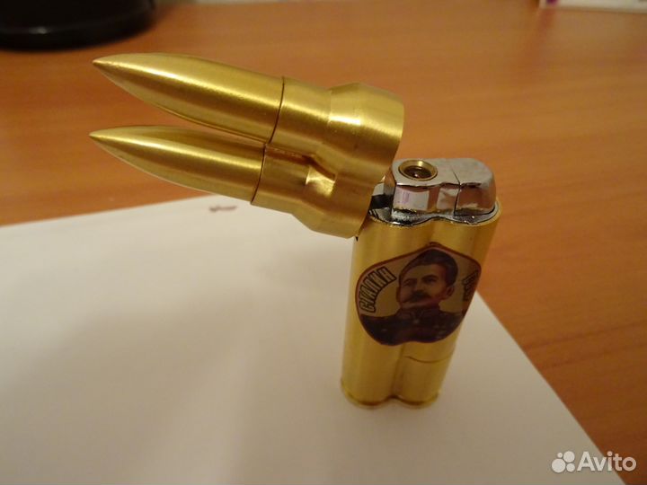 Зажигалка в форме патронов с портретом Сталина
